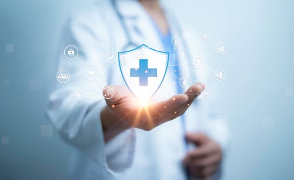 A Medical Worker Holding Of Health Care Icons. Medical Technology