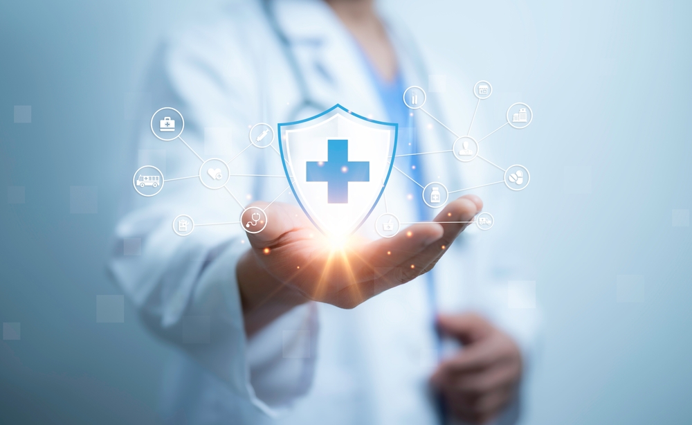 A Medical Worker Holding Of Health Care Icons. Medical Technology