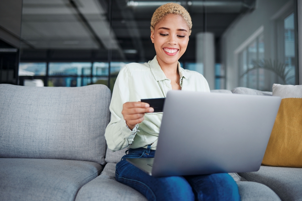 Woman with Laptop And Credit Card Online Shopping